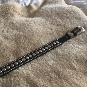 Nadim leather belt with silver in color brads